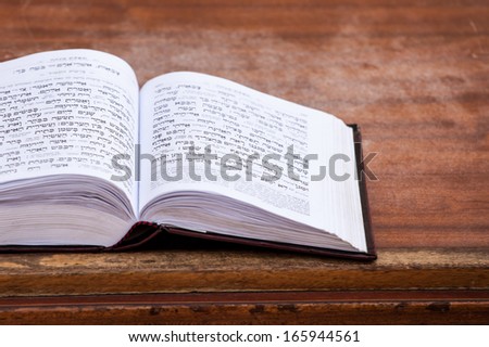 Jewish praying book on table. Royalty-Free Stock Photo #165944561