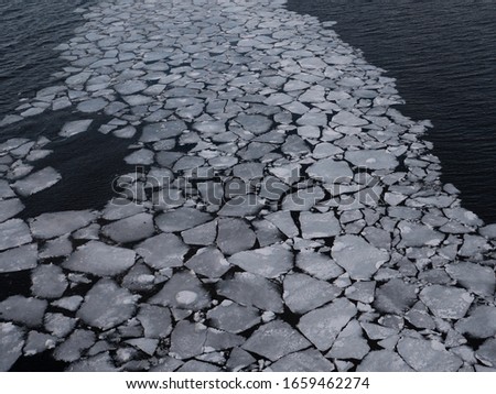 small ice floes in the Altafjord near the city of Alta in Norway

