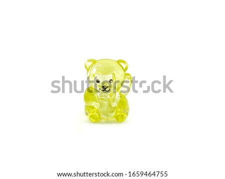 Cute yellow bear on white background.