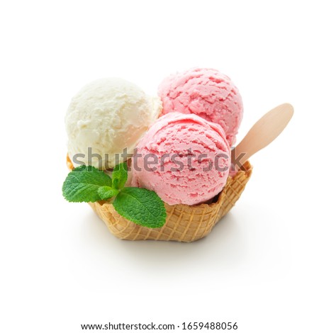 Various colorful ice cream balls with mint leaf in waffle basket isolated on white background