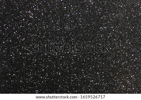 Black surface with glare. Black and white texture background. Royalty-Free Stock Photo #1659526717