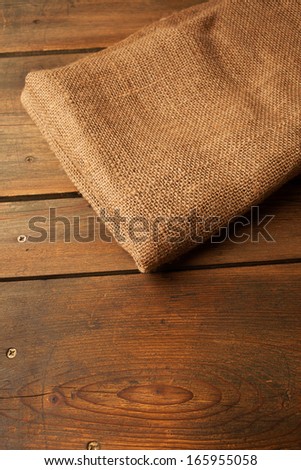 Wood and jute/Cookbook background. Wooden Table with jute coarse grain canvas texture ( seamless sackcloth )