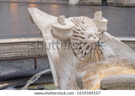 Night photo of the "Barcaccia fountain", Rome, Italy. Travertine marble located in the Spanish Steps, by Gian Lorenzo Bernini.
