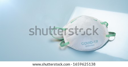 Anti virus protection mask ffp2 standart to prevent corona COVID-19 and Sars-CoV-2 infection Royalty-Free Stock Photo #1659625138