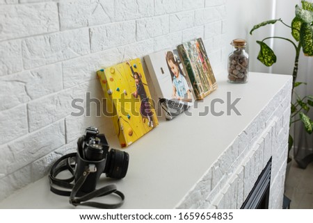 photo canvas on white brick wall collage in the interior