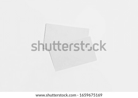 Business Cards Mock-up fan stack at white textured paper background.High resolution photo.