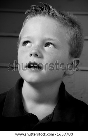 Black and white portrait of a young boy.