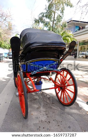Detail photo of historic traditional horse carriage parked in Kifisia district, North Athens, Attica, Greece
