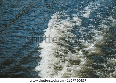 boat wave. Aerial view to ocean waves. water background