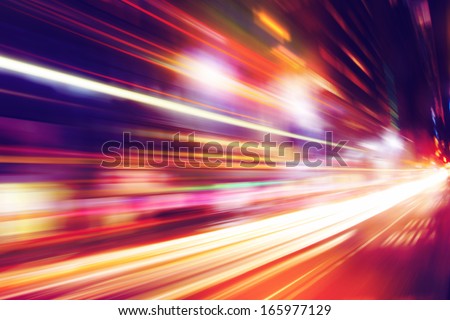 Abstract image of night traffic in the city. Royalty-Free Stock Photo #165977129