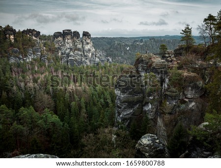 Magnificent cliffs in the area of Bastei, Germany. Beautiful nature screensaver