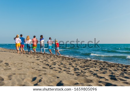 Summer holidays on the beach with friends
