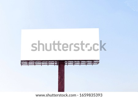 blank billboard on blue sky background for marketing announcements and details