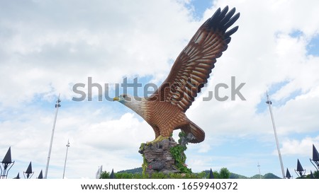 Langkawi, Malaysia - Mar 1, 2020 : A statue of a big eagle as a symbol and highlights of Langkawi Island. Located at Dataran Lang in Pekan Kuah near Langkawi Jetty Terminal. 
