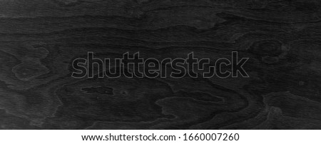 
Wooden black background with texture. Black plank banner.
