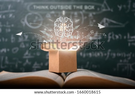 think outside the box on school green blackboard . startup  education concept. creative idea. leadership.