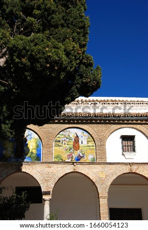 View of the cloisters in the Santa Clara Convent (Convento de Santa Clara) courtyard, Estepa, Seville Province, Andalusia, Spain, Western Europe.