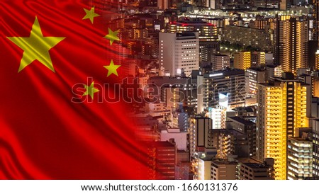 Chinese flag on the background of the evening city. Cities Of The Republic Of China. Life in PRC. Travel to China. Infrastructure of the Chinese city.