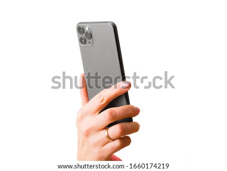 Person holding smartphone, photo isolated on white background