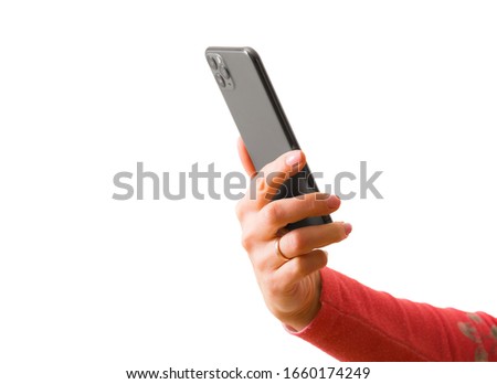 Person holding in hand smartphone, photo isolated on white background