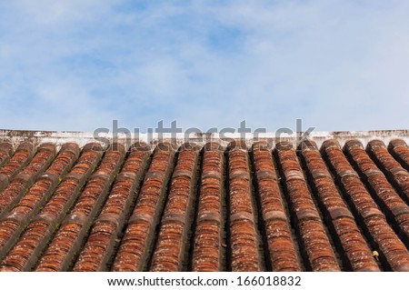 old style roof tile and blue sky