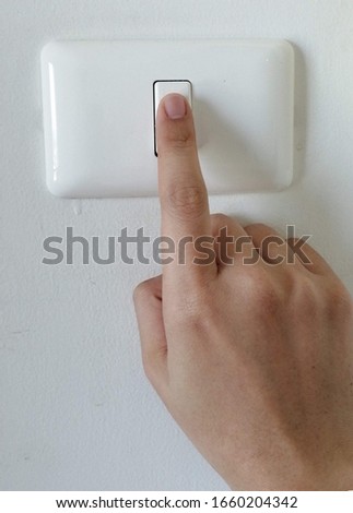 Press turn on/off electrical switch
