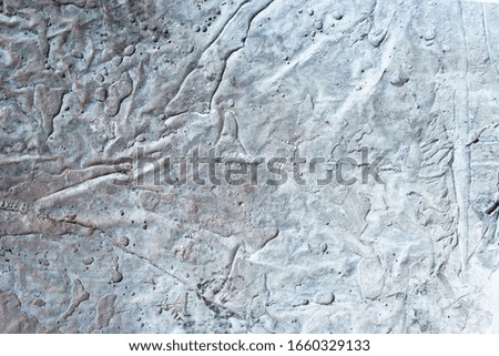 The texture of the old concrete wall. Gray-blue background.