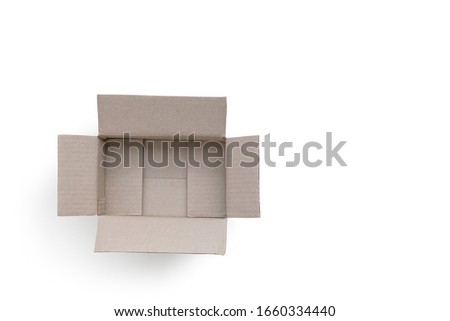 Open cardboard box isolated on white background. Top view of brown box for shopping online idea. With clipping path.