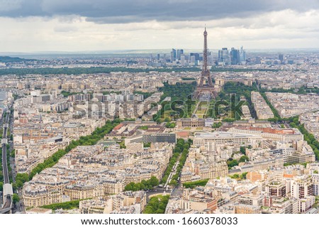 Eiffel Tower view from Tour Montparnasse with skyline of la defense in background