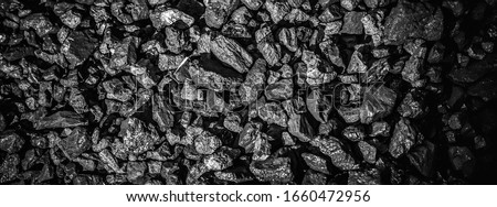 Coal mining. Black coals for background. Coals mining or energy source, environment protection. Volcanic rock.