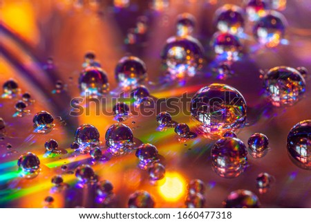 Reflection in drops of water.. Water drops full of color. Macro photography. 