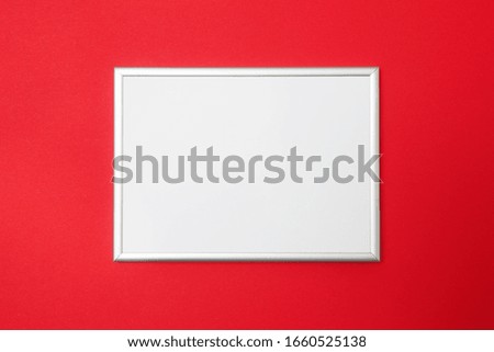 Photo frame on a red background