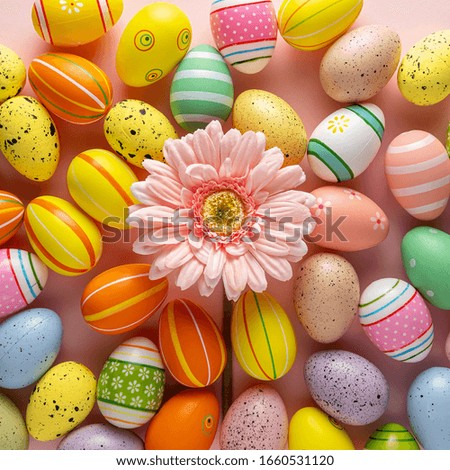 Creative layout with colorful Easter eggs and daisy flower. Minimal Easter background. Spring holidays concept.
