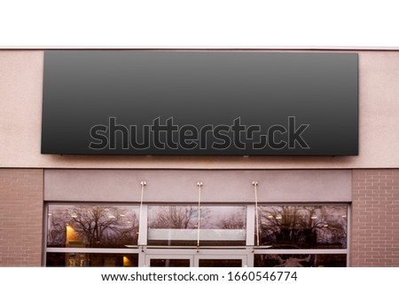 Mockup of the black blank rectangle hanging logo sign in frame on the building wall or facade