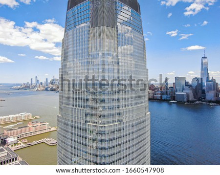 Jersey City waterfront with Goldman Sachs in daytime, aerial photography
