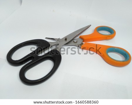 photo paper scissors with a white background