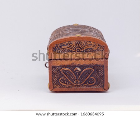 Colombian wood chest in a white background  Royalty-Free Stock Photo #1660634095
