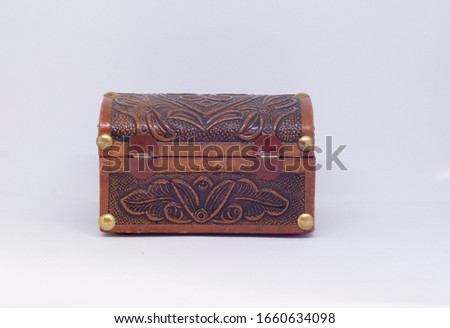 Colombian wood chest in a white background  Royalty-Free Stock Photo #1660634098