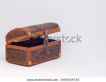 Colombian wood chest in a white background  Royalty-Free Stock Photo #1660634110