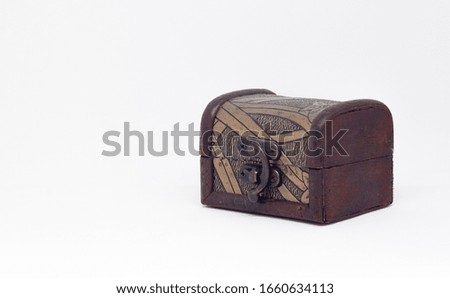 Colombian wood chest in a white background  Royalty-Free Stock Photo #1660634113