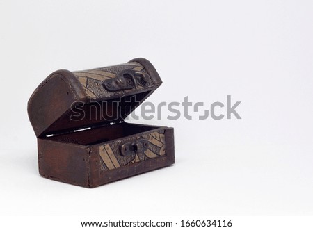Colombian wood chest in a white background  Royalty-Free Stock Photo #1660634116