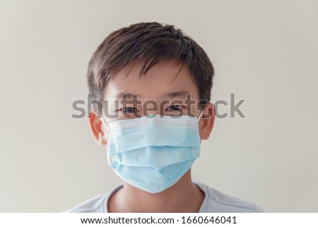 Asian preteen boy student wearing medical face mask, back to school, school reopen, delta covid19 virus , social distancing, new normal, air pollution and health concept