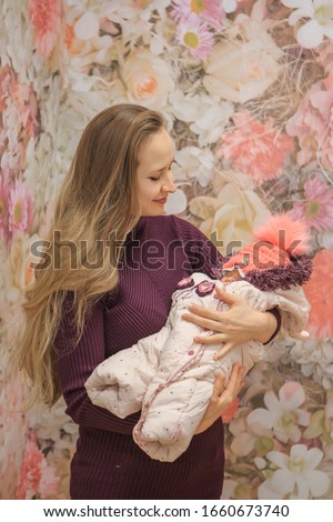 the concept of a healthy lifestyle, the protection of children, shopping - baby in the arms of the mother. Woman holding a child. Isolated on white background. Copy space. extract from the hospital