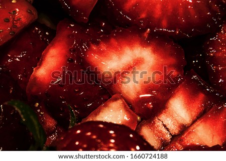 Macro. Jelly with strawberry in pieces. Jam.