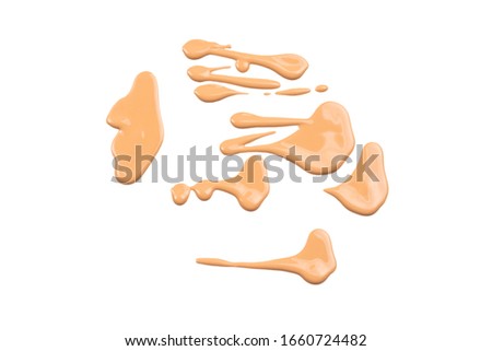 Liquid foundation swatch isolated on white background. Close Up of makeup cream sample.