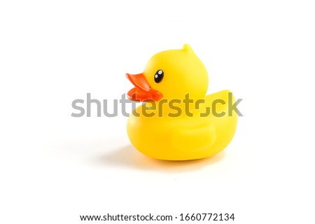 Take a close up shot of the toy duck Royalty-Free Stock Photo #1660772134