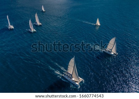 Regatta in the Indian Ocean, monohulls and catamarans Royalty-Free Stock Photo #1660774543
