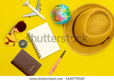 Top view of Traveler's accessories and essential vacation items.Travelling planning on holiday concept.