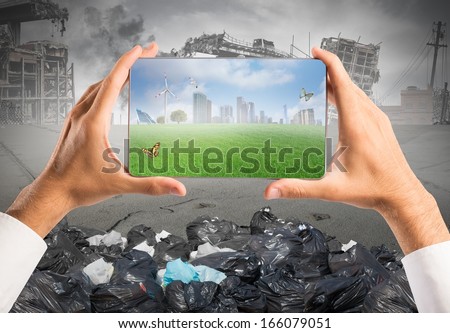 Concept of sustainable development with green vision in a tablet Royalty-Free Stock Photo #166079051
