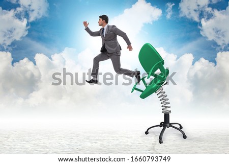 Promotion concept with businessman ejected from chair Royalty-Free Stock Photo #1660793749